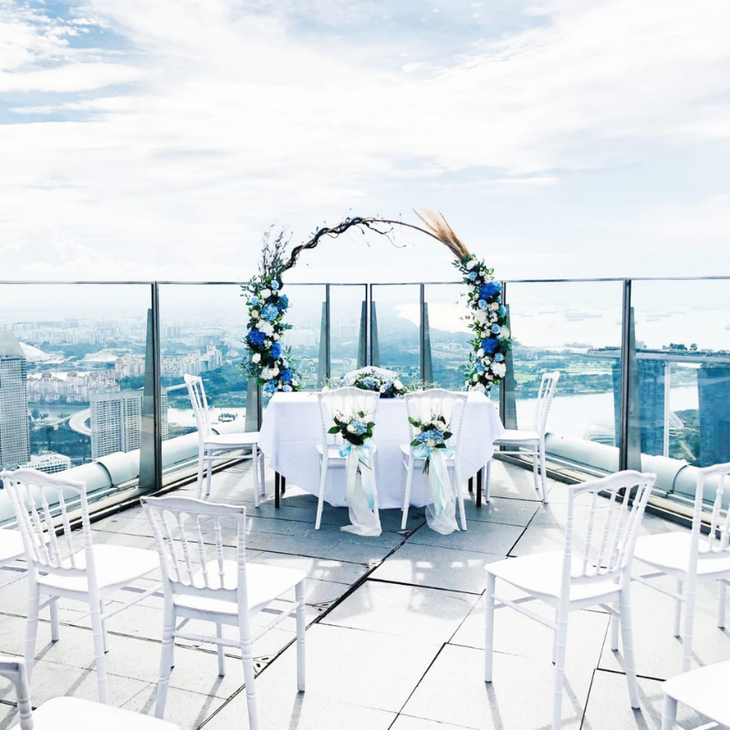 Rooftop solemnisation setup with city view